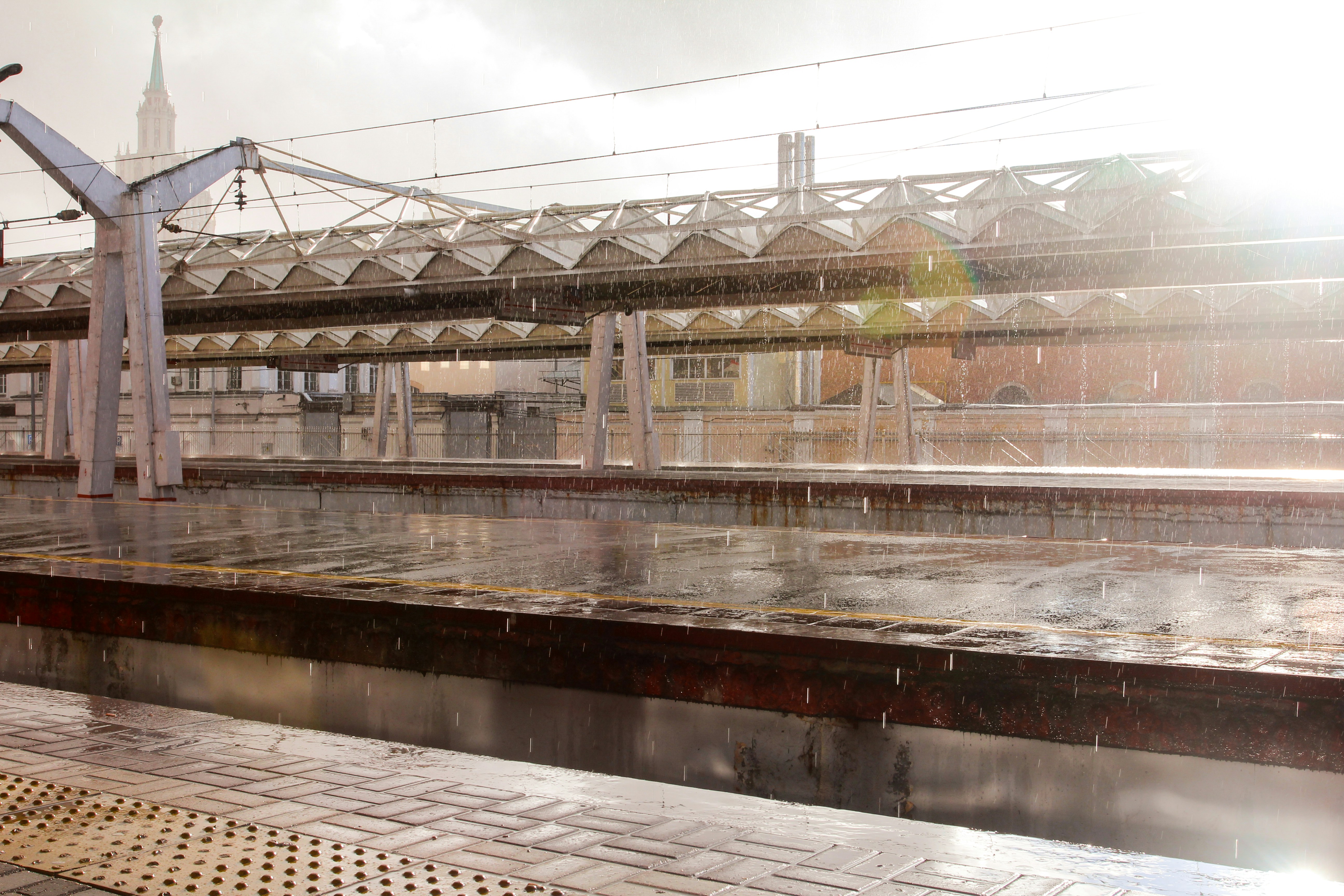 I was just smoking at the station when suddenly rain started. Fortunately, my camera was with me :)