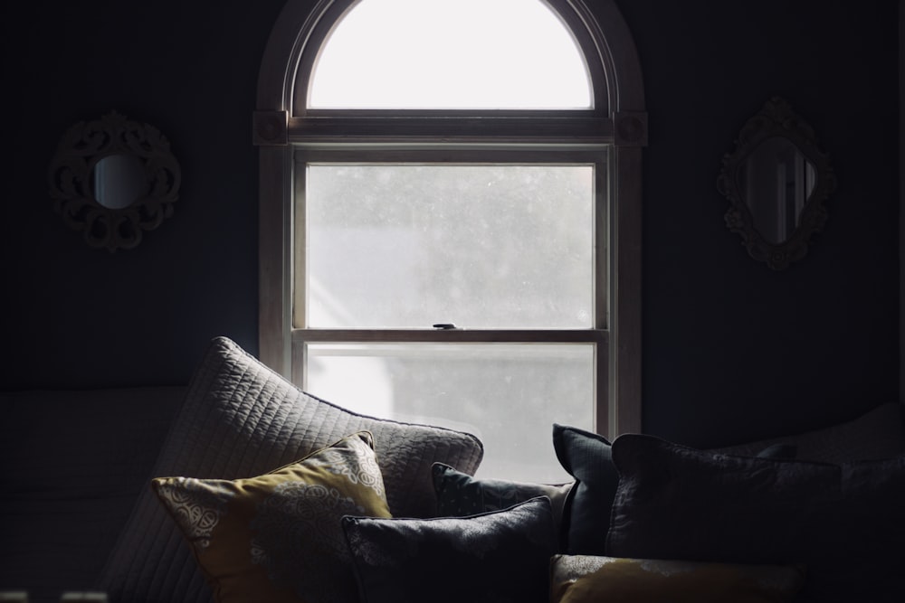 white and yellow throw pillows