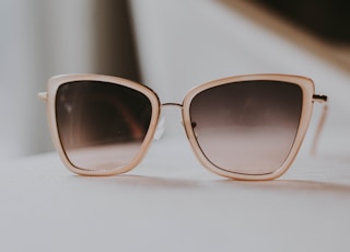 gray sunglasses with white frames