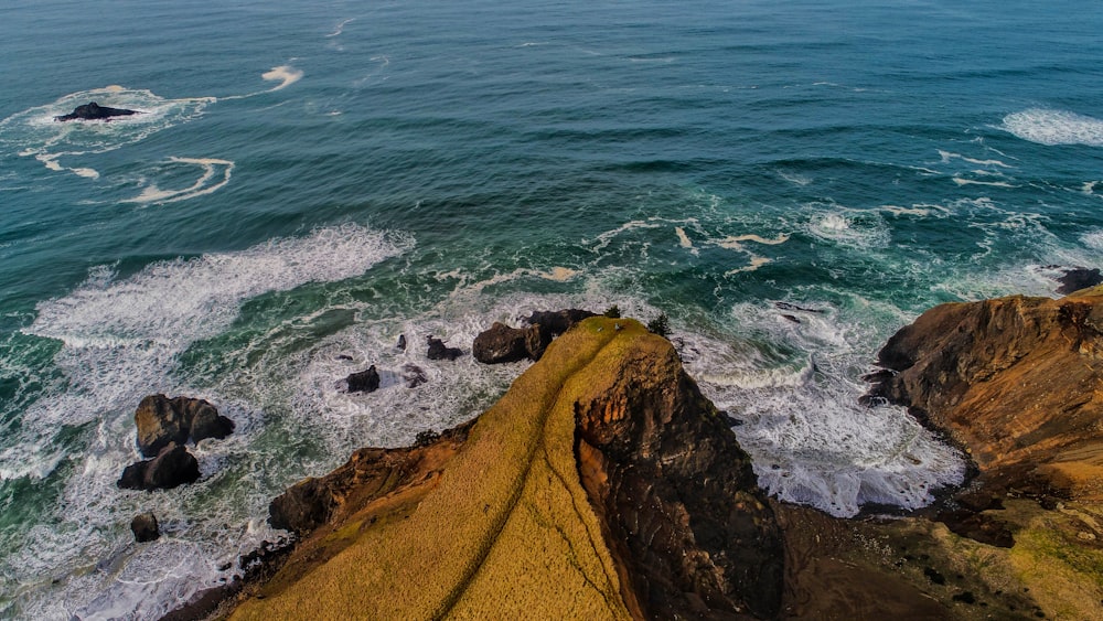 body wave of water near mountain