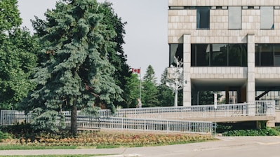 beige concrete building with wheelchair ramp