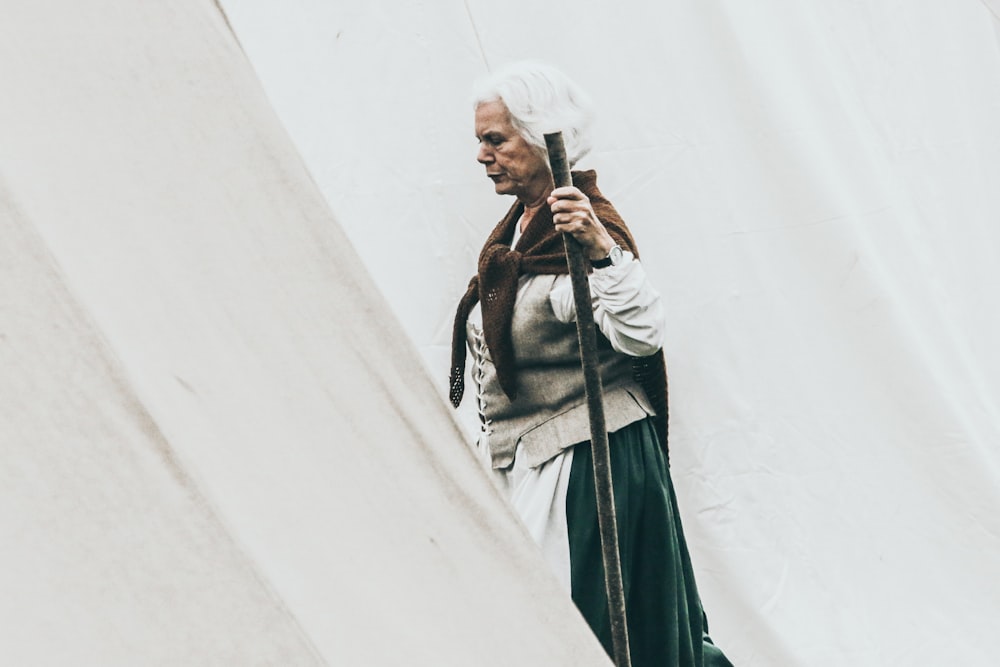 woman holding wand