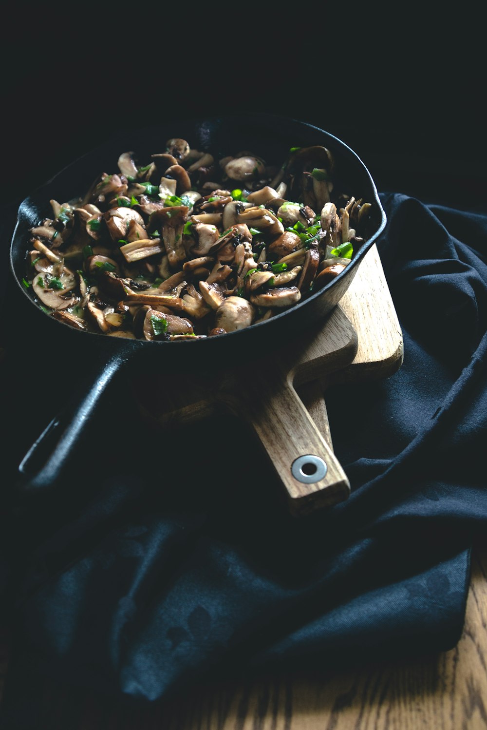 black frying pan with food on top