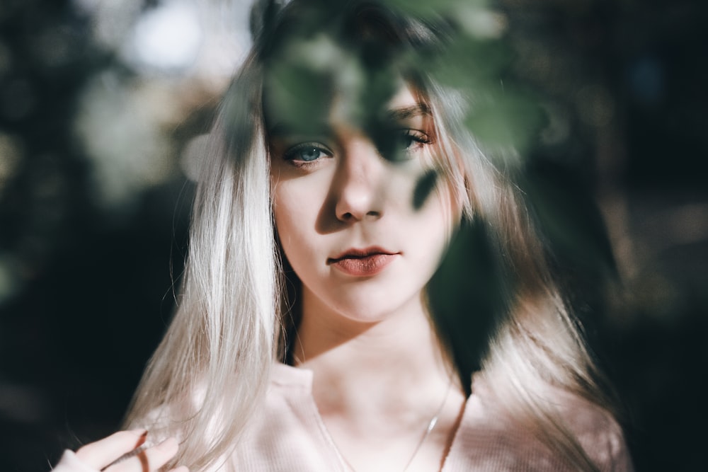 shallow focus photo of woman