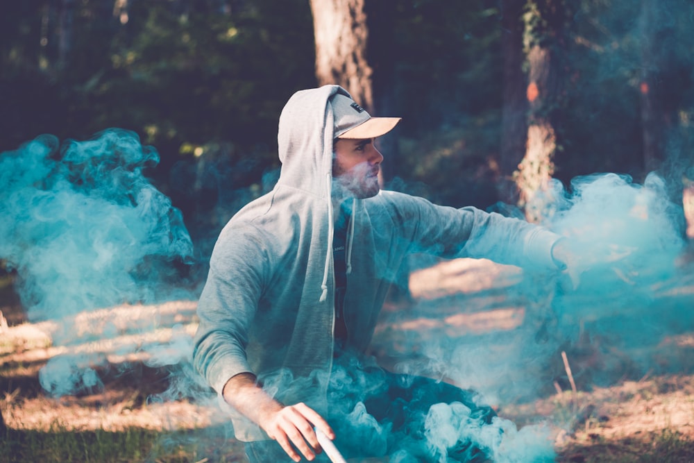 man doing smoke tricks