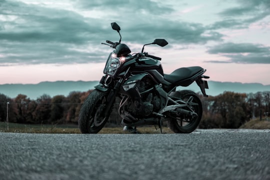 black and gray motorcycle low angle photography in Geneva Switzerland