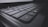 A close-up view of a black computer keyboard displaying several keys in focus, including shift, ctrl, and windows keys. The image emphasizes the texture and design of the keys with a slightly dark and moody atmosphere.