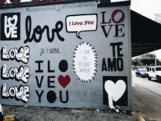 white wall with love graffiti