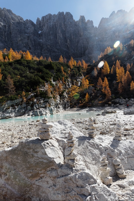 gray balancing stones in Lago di Sorapis Italy