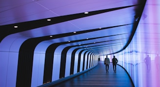 man walking through pathway