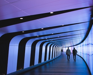 man walking through pathway