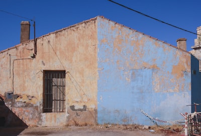 white and gray concrete building at daytime chimney google meet background