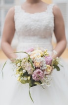 bride holding bouquet flowers
