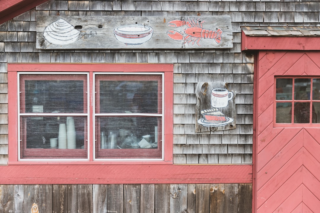 pink and gray wooden cafe front, local lobster