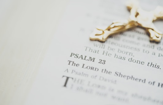 gold-colored crucifix