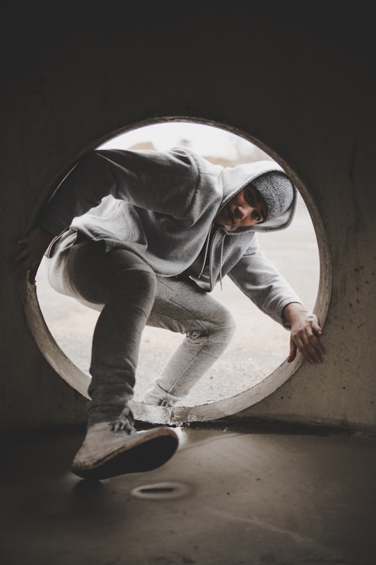 man entering hole in Boston United States