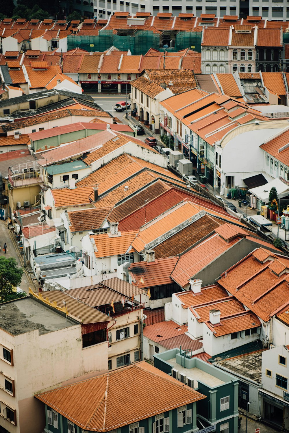 aerial view of houses with brown roofs