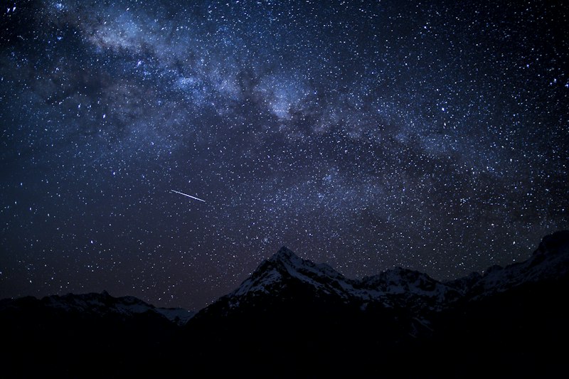 silhouette of mountain peak at nighttime