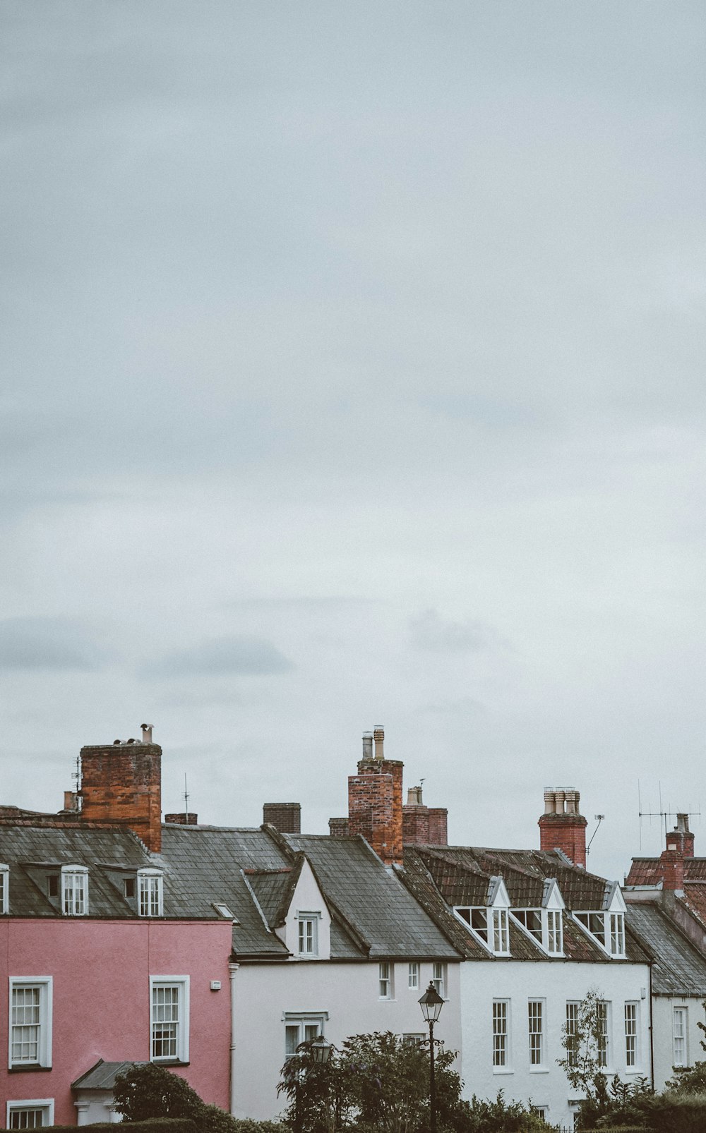 houses under cloudy sky