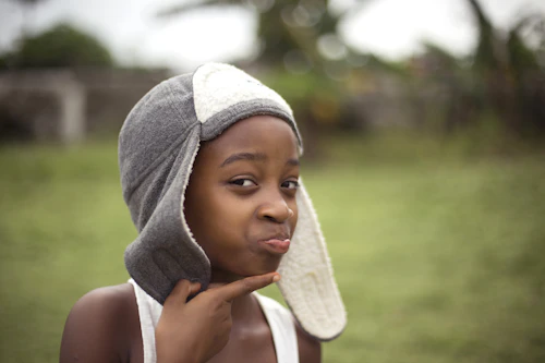 Boy relaxing on the grass field