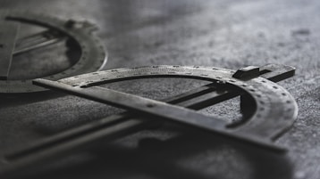 grayscale photo of measuring equipment