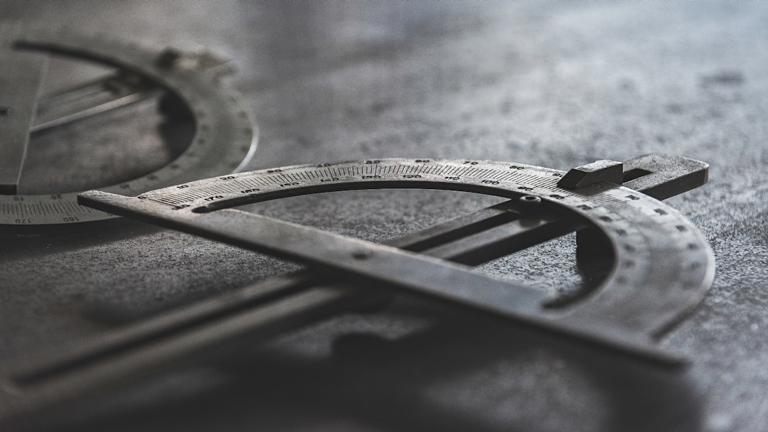 grayscale photo of measuring equipment, Compass