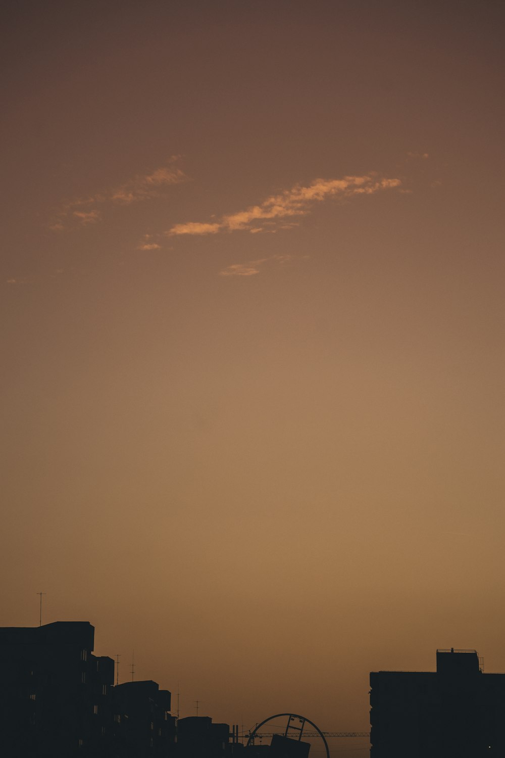 silhouette of building during golden hour