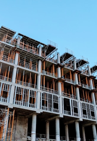 gray concrete building under construction