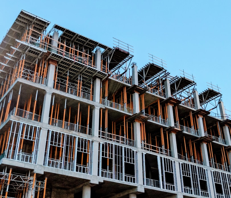 gray concrete building under construction