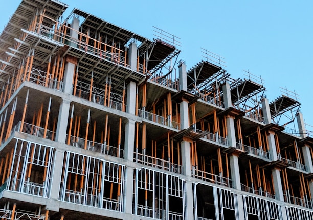 gray concrete building under construction