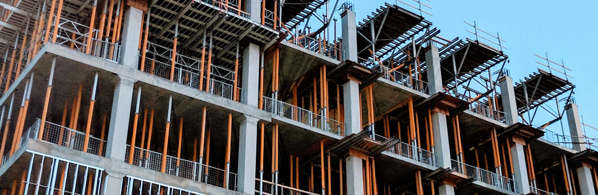 gray concrete building under construction