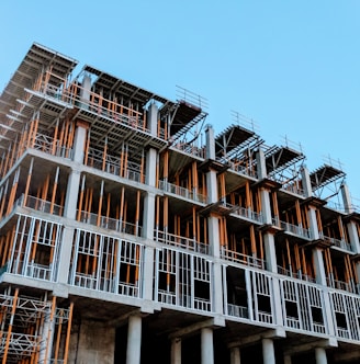 gray concrete building under construction