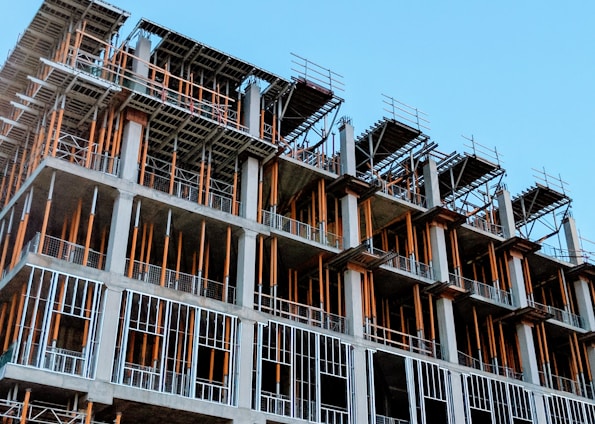 gray concrete building under construction