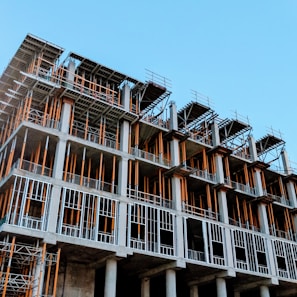 gray concrete building under construction