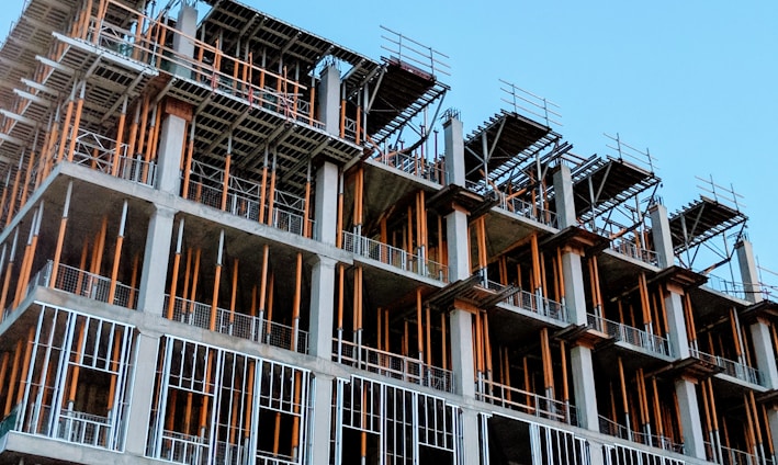 gray concrete building under construction