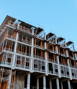 gray concrete building under construction