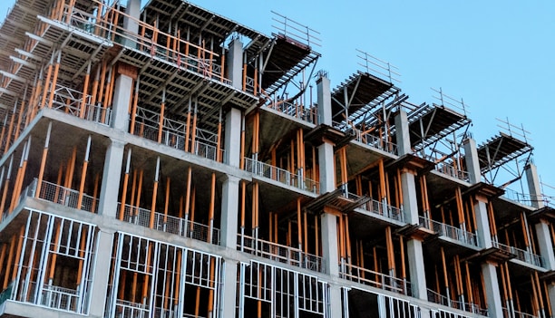 gray concrete building under construction