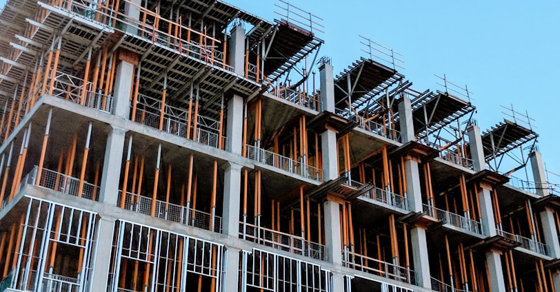 gray concrete building under construction