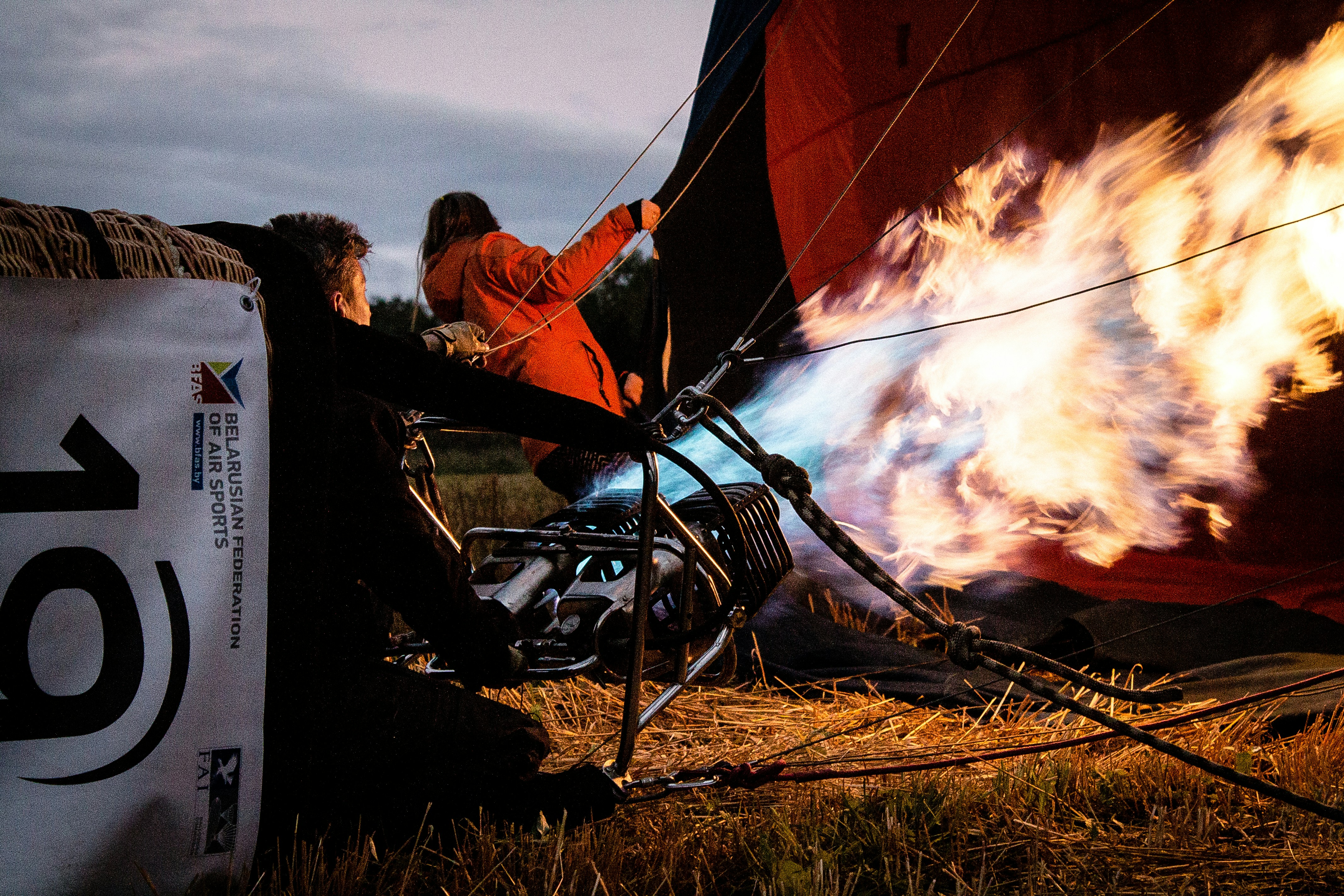 two man preparing hot air balloon