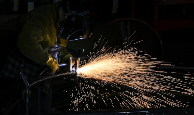 time lapse photography of welding man