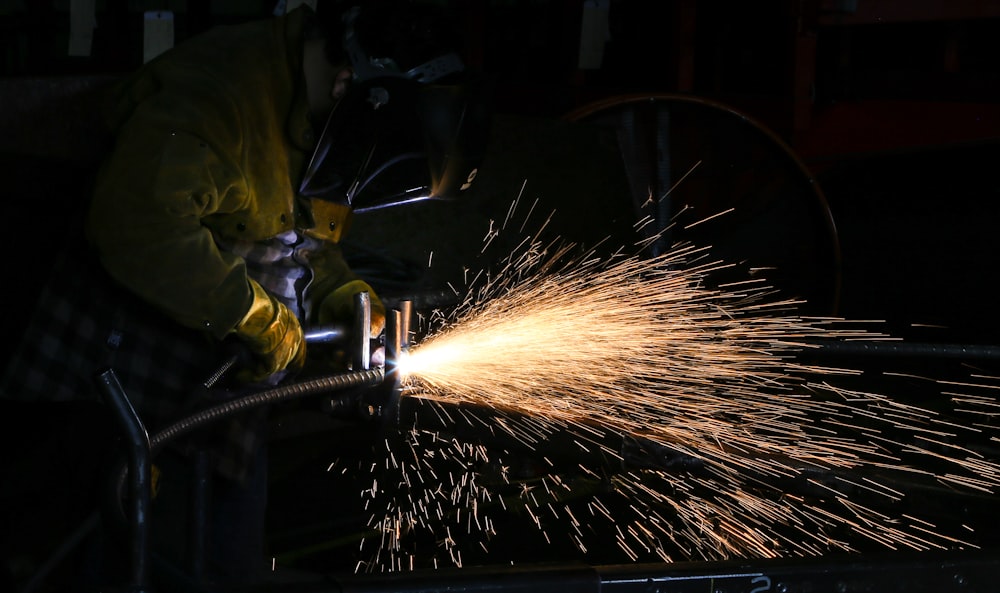 time lapse photography of welding man