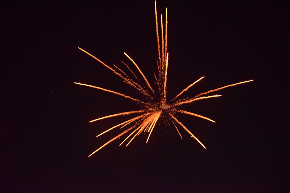 brown fireworks on sky during night time