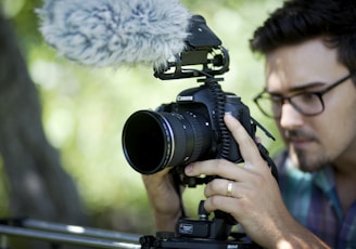 man holding camera slider