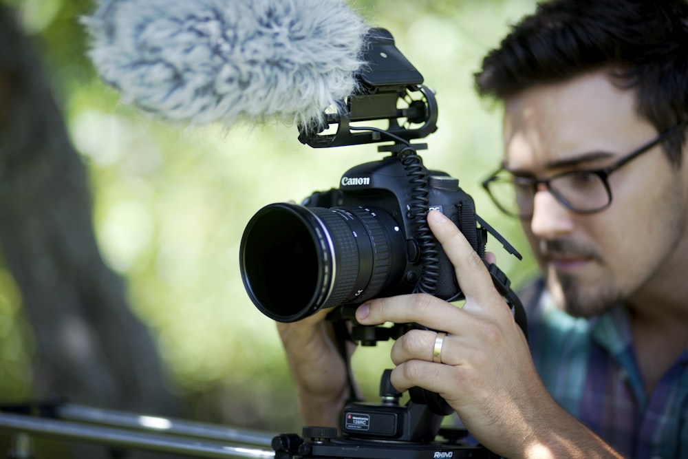 man holding camera slider