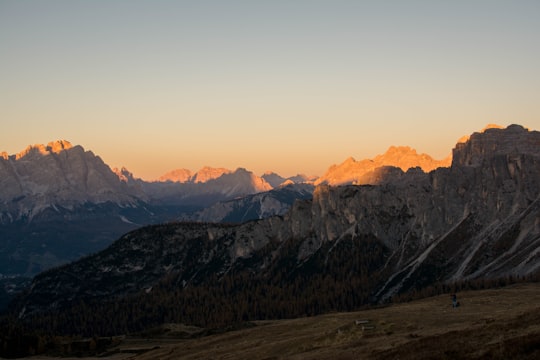 brown rock mountains under white sky in Giau Pass Italy