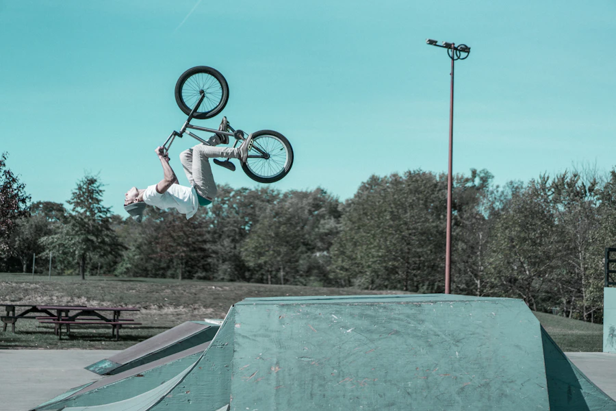 Man doing BMX bike stunts