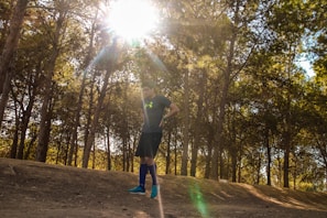 An influencer sharing authentic moments using sports science gear outdoors.