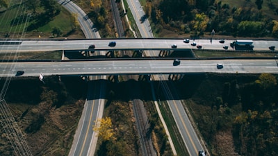 An aerial view of trucks on an interstate highway.