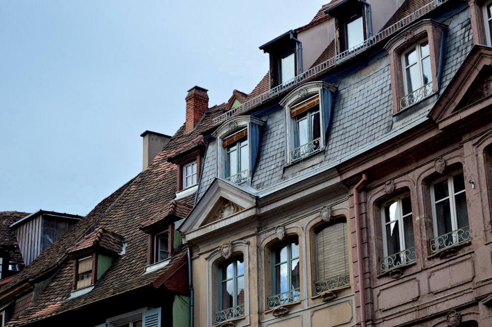 beige wall paint house during daytime