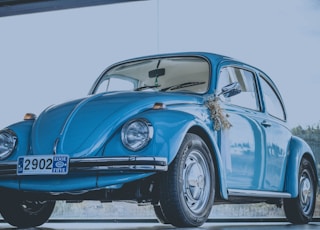 blue Volkswagen Beetle